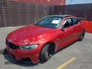 ✅ 2015 BMW M4 • VIN: WBS3R9C52FK330971 • Lot: 42467989. Listed on IAAI with 99,353 mi. Free auction sales archive from the USA and detailed vehicle history report at DreamBid. Image 2.