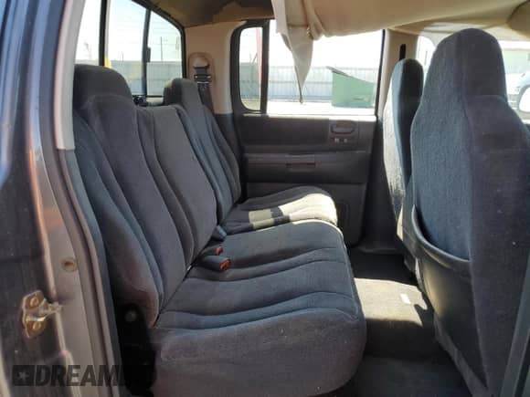 2003 Dodge Dakota Sport z VIN 1D7HG38N13S101403, wystawiony jako Copart lot #50814875 z przebiegiem 15 396 mil mil oraz Czysty tytuł • Clean title. Historia ofert i sprzedaży dostępna na DreamBid. Obrazek 10.