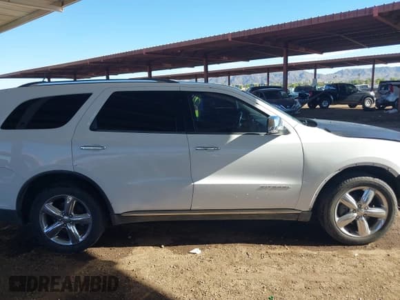 ✅ 2013 Dodge Durango Citadel • VIN: 1C4SDHET0DC690982 • Lot: 43392470. Listed on IAAI with 210,656 mi. Free auction sales archive from the USA and detailed vehicle history report at DreamBid. Image 12.