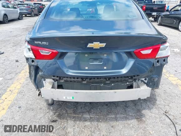 2019 Chevrolet Malibu LS with VIN 1G1ZB5ST0KF195919, listed as a IAAI auction lot 42928307 with 69,952 mi miles and . Bid and sale history available at DreamBid. Image 6.