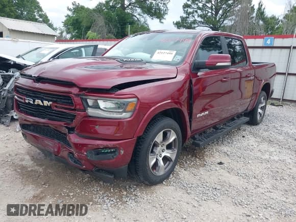 ✅ 2021 Ram 1500 Laramie • VIN: 1C6RREJT1MN767990 • Lot: 42127495. Listed on IAAI with 80,037 mi. Free auction sales archive from the USA and detailed vehicle history report at DreamBid. Image 17.