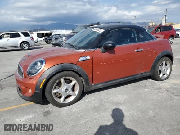 ✅ 2013 MINI Coupe S • VIN: WMWSX3C59DT466802 • Лот: 56860965. Опубликован ранее на Copart с пробегом 88 053 миль. Бесплатный доступ к архиву аукционных продаж из США и подробный отчёт об истории автомобиля на DreamBid. Изображение 1.