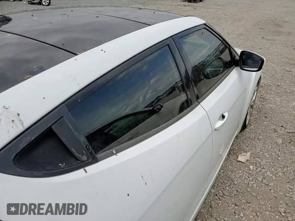 2012 Hyundai Veloster w/Red Int z VIN KMHTC6AD4CU083000, wystawiony jako Copart lot #53200115 z przebiegiem 123 074 mil mil oraz Szkoda całkowita • Salvage title. Historia ofert i sprzedaży dostępna na DreamBid. Obrazek 13.