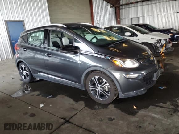 ✅ 2017 Chevrolet Bolt EV Premier • VIN: 1G1FX6S01H4136348 • Lot: 89660895. Listed on Copart with 77,383 mi. Free auction sales archive from the USA and detailed vehicle history report at DreamBid. Image 4.