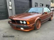 ✅ 1988 BMW 6 Series • VIN: WBAEC8411J3267143 • Lot: 81428764. Listed on Copart with 165,313 mi. Free auction sales archive from the USA and detailed vehicle history report at DreamBid. Image 2.