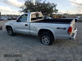 ✅ 2003 Dodge Dakota • VIN: 1D7GG16X33S130101 • Lot: 85999314. Wystawiony na Copart z przebiegiem 221 292 mil. Bezpłatny archiwum sprzedaży aukcyjnych z USA i szczegółowy raport historii pojazdu na DreamBid. Zdjęcie 2.