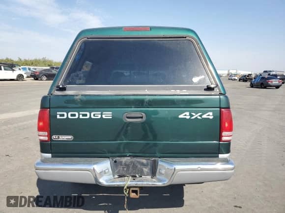 2001 Dodge Dakota Sport z VIN 1B7GG26N81S262671, wystawiony jako Copart lot #71080995 z przebiegiem 145 480 mil mil oraz Szkoda całkowita • Salvage title. Historia ofert i sprzedaży dostępna na DreamBid. Obrazek 10.