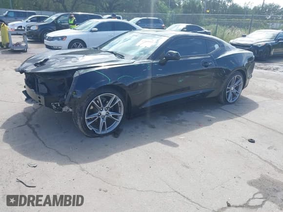 ✅ 2021 Chevrolet Camaro 1LT • VIN: 1G1FB1RS0M0114531 • Lot: 43363088. Listed on IAAI with 52,499 mi. Free auction sales archive from the USA and detailed vehicle history report at DreamBid. Image 2.