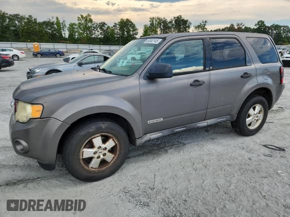 ✅ 2009 Ford Escape XLS • VIN: 1FMCU02739KC80165 • Lot: 69343145. Listed on Copart with 241,491 mi. Free auction sales archive from the USA and detailed vehicle history report at DreamBid. Image 1.