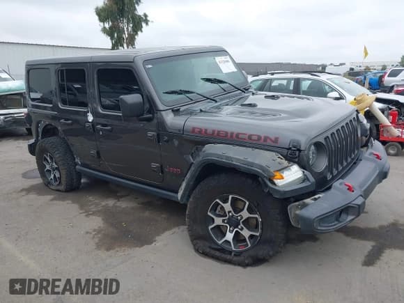 ✅ 2020 Jeep Wrangler Unlimited Rubicon • VIN: 1C4HJXFG1LW233075 • Lot: 42328486. Listed on IAAI with 85,359 mi. Free auction sales archive from the USA and detailed vehicle history report at DreamBid. Image 1.