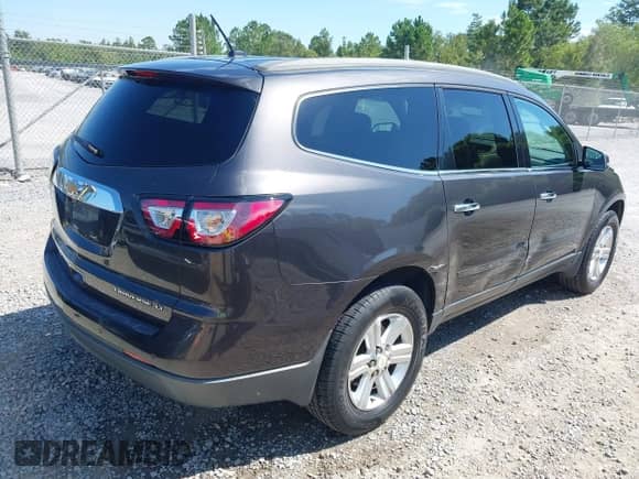 2014 Chevrolet Traverse LT with VIN 1GNKRHKD6EJ117426, listed as a IAAI auction lot 43116597 with 160,355 mi miles and . Bid and sale history available at DreamBid. Image 4.