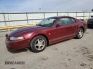 ✅ 2004 Ford Mustang Standard • VIN: 1FAFP406X4F148246 • Lot: 52475415. Listed on Copart with 155,429 mi. Free auction sales archive from the USA and detailed vehicle history report at DreamBid. Image 1.