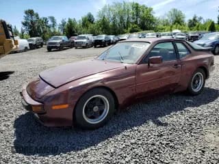 ✅ 1984 Porsche 944 • VIN: WP0ZZZ94ZEN457555 • Lot: 58582035. Wystawiony na Copart z przebiegiem 32 521 mil. Bezpłatny archiwum sprzedaży aukcyjnych z USA i szczegółowy raport historii pojazdu na DreamBid. Zdjęcie 1.