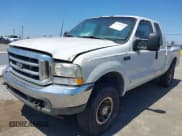 ✅ 2003 Ford F-250 XL • VIN: 1FTNX20L93ED80955 • Lot: 42160315. Listed on IAAI with 311,244 mi. Free auction sales archive from the USA and detailed vehicle history report at DreamBid. Image 2.