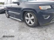 ✅ 2014 Jeep Grand Cherokee Overland • VIN: 1C4RJFCT7EC385141 • Lot: 43493085. Listed on IAAI with 154,525 mi. Free auction sales archive from the USA and detailed vehicle history report at DreamBid. Image 6.