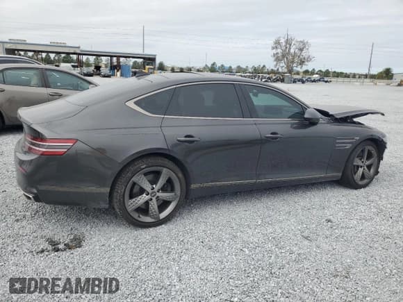 ✅ 2023 Genesis G80 Sport • VIN: KMTGB4SD1PU185034 • Лот: 89306795. Опубликован ранее на Copart с пробегом 10 335 миль. Бесплатный доступ к архиву аукционных продаж из США и подробный отчёт об истории автомобиля на DreamBid. Изображение 3.