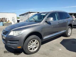 ✅ 2010 Volkswagen Touareg VR6 • VIN: WVGBF7A91AD001130 • Lot: 67439685. Wystawiony na Copart z przebiegiem 82 958 mil. Bezpłatny archiwum sprzedaży aukcyjnych z USA i szczegółowy raport historii pojazdu na DreamBid. Zdjęcie 1.