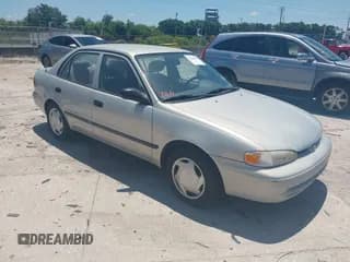 ✅ 2001 Chevrolet Prizm • VIN: 1Y1SK52861Z421412 • Lot: 42535992. Listed on IAAI with 72,632 mi. Free auction sales archive from the USA and detailed vehicle history report at DreamBid. Image 1.