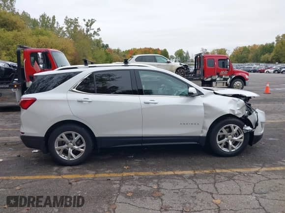 2019 Chevrolet Equinox LT with VIN 2GNAXVEX4K6267162, listed as a IAAI auction lot 43445786 with 73,104 mi miles and . Bid and sale history available at DreamBid. Image 14.