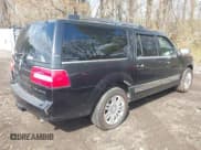 ✅ 2014 Lincoln Navigator • VIN: 5LMJJ3J56EEL04885 • Lot: 42051762. Listed on IAAI with 162,851 mi. Free auction sales archive from the USA and detailed vehicle history report at DreamBid. Image 4.