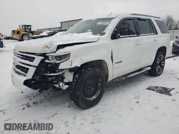 2020 Chevrolet Tahoe Premier with VIN 1GNSKCKJXLR182971, listed as a Copart auction lot 87268634 with 210,000 mi miles and Salvage title. Bid and sale history available at DreamBid. Image 1.