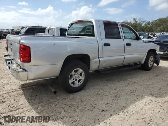 2005 Dodge Dakota SLT with VIN 1D7HE48K35S337930, listed as a Copart auction lot 79175974 with 114,816 mi miles and Salvage title. Bid and sale history available at DreamBid. Image 3.