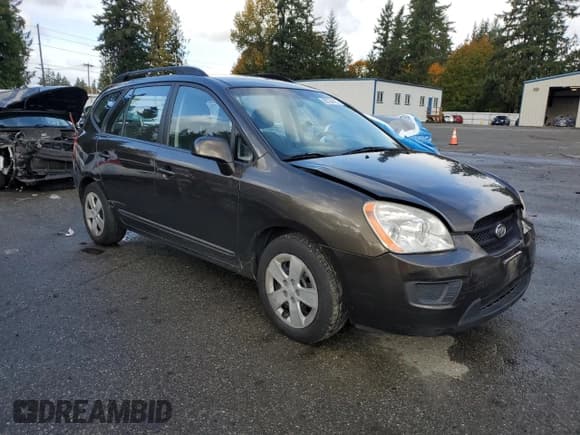✅ 2009 Kia Rondo LX • VIN: KNAFG528297269155 • Лот: 90724425. Опубликован ранее на Copart с пробегом 184 346 миль. Бесплатный доступ к архиву аукционных продаж из США и подробный отчёт об истории автомобиля на DreamBid. Изображение 4.