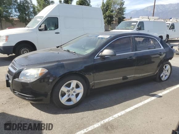✅ 2012 Chevrolet Malibu 1LS • VIN: 1G1ZB5E00CF209207 • Lot: 77158644. Listed on Copart with 107,161 mi. Free auction sales archive from the USA and detailed vehicle history report at DreamBid. Image 1.