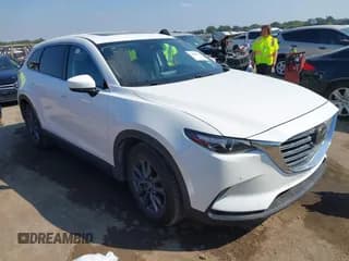 ✅ 2021 Mazda CX-9 Touring • VIN: JM3TCACY4M0518671 • Lot: 43405221. Wystawiony na IAAI z przebiegiem 78 191 mil. Bezpłatny archiwum sprzedaży aukcyjnych z USA i szczegółowy raport historii pojazdu na DreamBid. Zdjęcie 1.