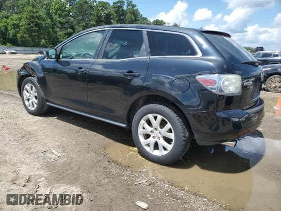 ✅ 2009 Mazda CX-7 Sport • VIN: JM3ER293390218622 • Lot: 64310045. Listed on Copart with 206,205 mi. Free auction sales archive from the USA and detailed vehicle history report at DreamBid. Image 2.