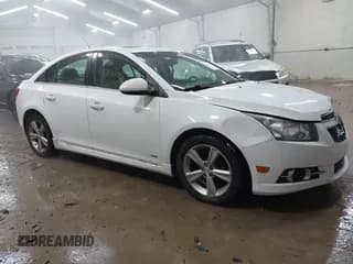 ✅ 2014 Chevrolet Cruze 2LT • VIN: 1G1PE5SB1E7238331 • Lot: 43696667. Listed on IAAI with 134,614 mi. Free auction sales archive from the USA and detailed vehicle history report at DreamBid. Image 1.