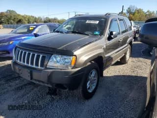 ✅ 2004 Jeep Grand Cherokee Laredo • VIN: 1J4GW48SX4C373684 • Лот: 85924885. Опубликован ранее на Copart с пробегом 173 326 миль. Бесплатный доступ к архиву аукционных продаж из США и подробный отчёт об истории автомобиля на DreamBid. Изображение 1.