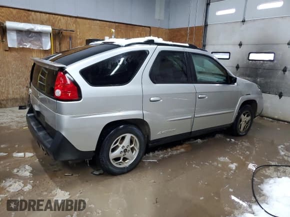 ✅ 2005 Pontiac Aztek • VIN: 3G7DB03E05S519440 • Lot: 82629564. Listed on Copart with 132,234 mi. Free auction sales archive from the USA and detailed vehicle history report at DreamBid. Image 3.