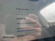 ✅ 2023 Tesla Model Y Long Range • VIN: 7SAYGAEEXPF842044 • Лот: 90837975. Опубликован ранее на Copart с пробегом 68 860 миль. Бесплатный доступ к архиву аукционных продаж из США и подробный отчёт об истории автомобиля на DreamBid. Изображение 9.