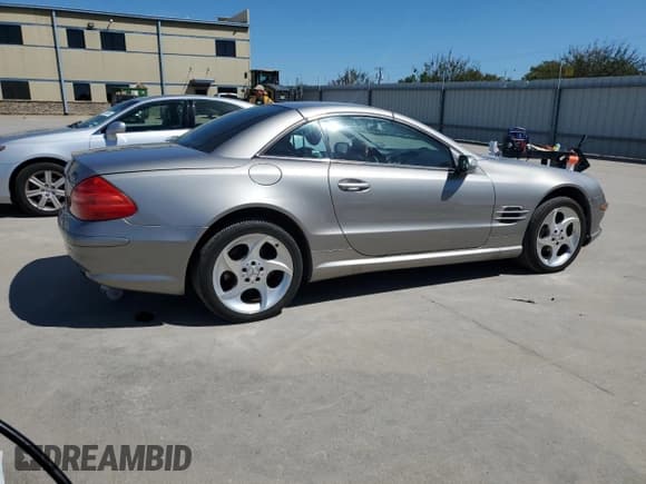 ✅ 2005 Mercedes-Benz SL 500 • VIN: WDBSK75F45F098073 • Лот: 73401994. Опубликован ранее на Copart с пробегом 83 860 миль. Бесплатный доступ к архиву аукционных продаж из США и подробный отчёт об истории автомобиля на DreamBid. Изображение 3.