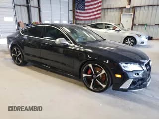 ✅ 2014 Audi RS 7 Prestige • VIN: WUAW2BFC6EN903378 • Лот: 67889104. Опубликован ранее на Copart с пробегом 98 546 миль. Бесплатный доступ к архиву аукционных продаж из США и подробный отчёт об истории автомобиля на DreamBid. Изображение 4.