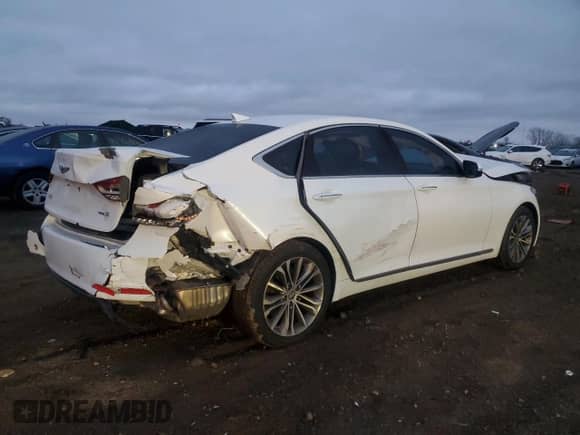 2015 Hyundai Genesis 3.8L z VIN KMHGN4JE6FU017769, wystawiony jako Copart lot #82062494 z przebiegiem 119 115 mil mil oraz Szkoda całkowita • Salvage title. Historia ofert i sprzedaży dostępna na DreamBid. Obrazek 3.