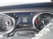 ✅ 2023 Jeep Wrangler Sahara • VIN: 1C4JJXP63PW579805 • Lot: 43401399. Listed on IAAI with 41,989 mi. Free auction sales archive from the USA and detailed vehicle history report at DreamBid. Image 7.