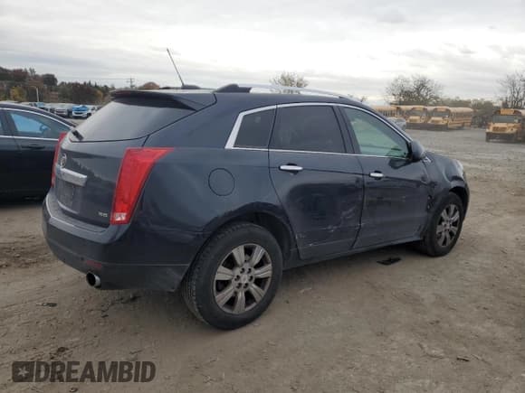 ✅ 2015 Cadillac SRX Luxury Collection • VIN: 3GYFNBE3XFS610347 • Lot: 89700305. Listed on Copart with 111,952 mi. Free auction sales archive from the USA and detailed vehicle history report at DreamBid. Image 3.