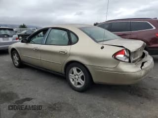 ✅ 2000 Ford Taurus SEL • VIN: 1FAFP56SXYG156437 • Lot: 71470284. Listed on Copart with 97,468 mi. Free auction sales archive from the USA and detailed vehicle history report at DreamBid. Image 2.