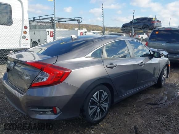 ✅ 2018 Honda Civic EX-T • VIN: JHMFC1F36JX027526 • Lot: 43692489. Listed on IAAI with 95,477 mi. Free auction sales archive from the USA and detailed vehicle history report at DreamBid. Image 4.