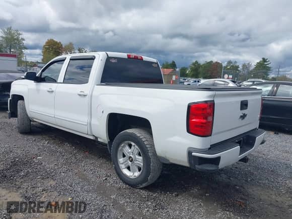 2017 Chevrolet Silverado 1500 LT with VIN 3GCUKREC8HG226281, listed as a IAAI auction lot 40446531 with 117,634 mi miles and . Bid and sale history available at DreamBid. Image 3.