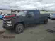 1997 Chevrolet Silverado 3500 with VIN 1GCHC33J3VF052789, listed as a Copart auction lot 86842835 with 137,985 mi miles and Salvage title. Bid and sale history available at DreamBid. Image 1.