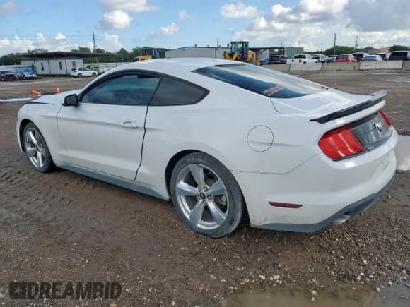 ✅ 2018 Ford Mustang EcoBoost • VIN: 1FA6P8TH7J5128901 • Lot: 81086665. Listed on Copart with 94,756 mi. Free auction sales archive from the USA and detailed vehicle history report at DreamBid. Image 2.