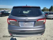 ✅ 2021 Honda Pilot EX-L • VIN: 5FNYF5H51MB028413 • Lot: 82764175. Listed on Copart with 52,831 mi. Free auction sales archive from the USA and detailed vehicle history report at DreamBid. Image 6.