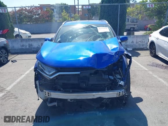 ✅ 2020 Honda CR-V Touring • VIN: 7FARW1H97LE011473 • Lot: 42368050. Listed on IAAI with 84,425 mi. Free auction sales archive from the USA and detailed vehicle history report at DreamBid. Image 12.