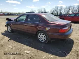 ✅ 2002 Mazda 626 LX • VIN: 1YVGF22DX25300041 • Лот: 52295855. Опубликован ранее на Copart с пробегом 29 040 миль. Бесплатный доступ к архиву аукционных продаж из США и подробный отчёт об истории автомобиля на DreamBid. Изображение 2.
