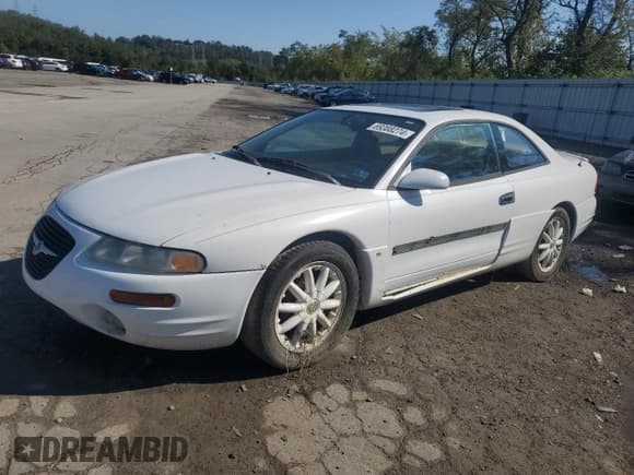 ✅ 1999 Chrysler Sebring LXi • VIN: 4C3AU52NXXE137946 • Лот: 69388274. Опубликован ранее на Copart с пробегом 163 385 миль. Бесплатный доступ к архиву аукционных продаж из США и подробный отчёт об истории автомобиля на DreamBid. Изображение 1.