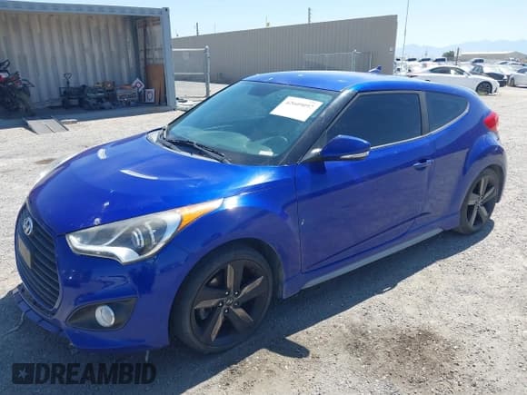 ✅ 2015 Hyundai Veloster Turbo • VIN: KMHTC6AE2FU218570 • Lot: 42609097. Wystawiony na IAAI z przebiegiem 104 965 mil. Bezpłatny archiwum sprzedaży aukcyjnych z USA i szczegółowy raport historii pojazdu na DreamBid. Zdjęcie 2.