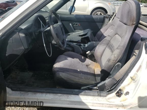 ✅ 1990 Mazda MX-5 Miata Special Edition • VIN: JM1NA3518L0152053 • Lot: 81409594. Wystawiony na Copart z przebiegiem 145 679 mil. Bezpłatny archiwum sprzedaży aukcyjnych z USA i szczegółowy raport historii pojazdu na DreamBid. Zdjęcie 7.